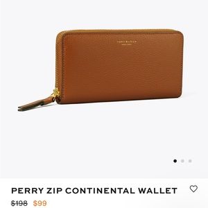 Tory Burch zipper wallet In tan.